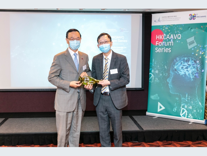 Souvenirs presentation. Left: Dr Kim Mak, BBS, JP, President of Caritas Institute of Higher Education; Right: Mr Albert Chow, Executive Director of HKCAAVQ